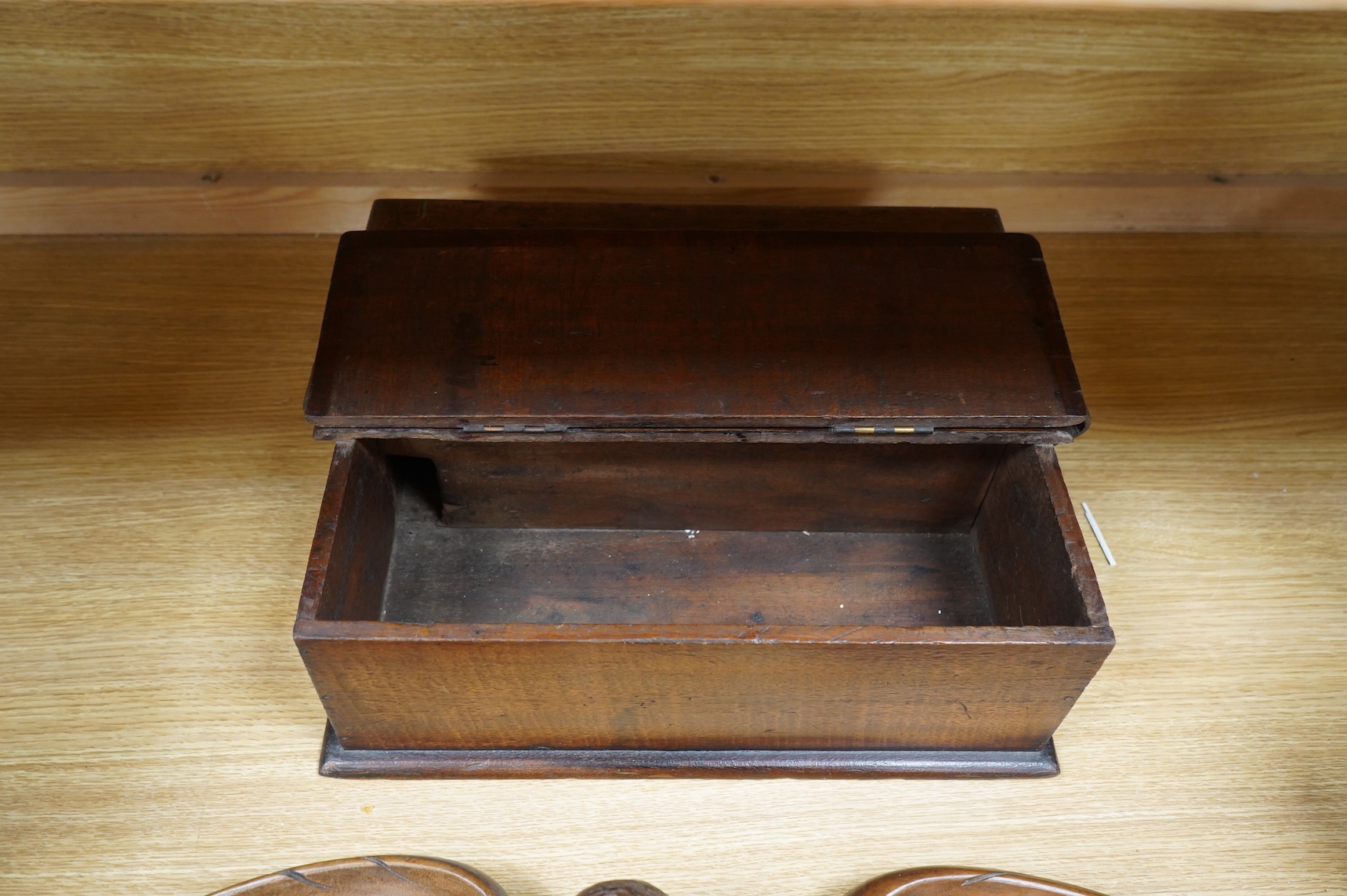 A mahogany leather-handled tool box and carved American eagle wall mount, largest 66cm wide